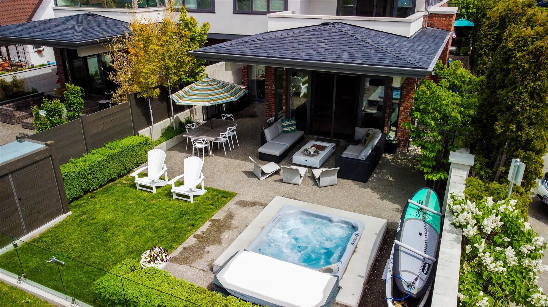 Rear yard and patio view of Abbott Lakeside Duplex